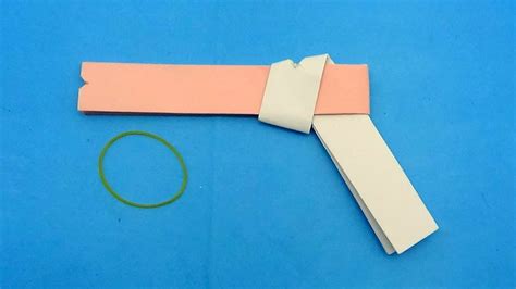 How To Make A Paper Gun That Shoots Rubber Bands - Easy Origami Gun ...