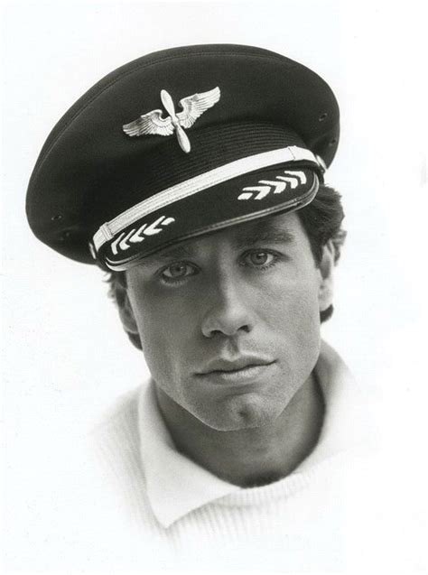 John Travolta Posing With His Pilot Hat, 1985. : r/OldSchoolCool