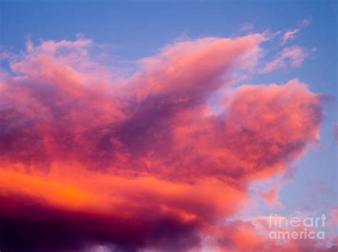 Cumulus clouds at sunset Photograph by Tracy Knauer | Fine Art America