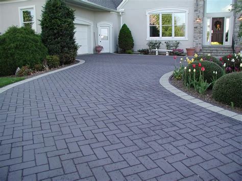 Herringbone Driveway with Brick Pavers