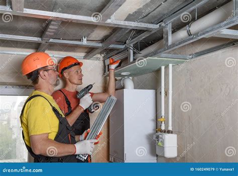 Plasterboard Installation on the Ceiling Stock Image - Image of fixing ...