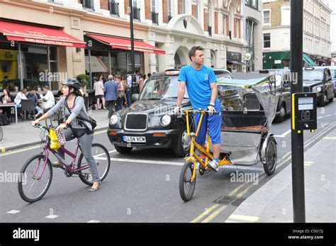 Pedicabs London West End pedal cabs Bugbugs rickshaws taxi passengers ...