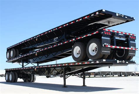 Steel-Flatbed-Trailers-Three-Stacked - Jet Co Trailers