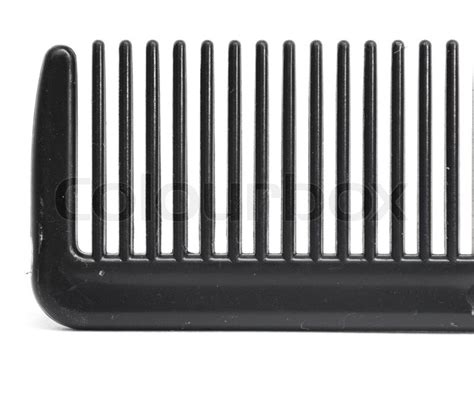 Teeth of the comb close | Stock Photo | Colourbox