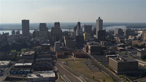 5.7K stock footage aerial video descending past tall high-rise office ...