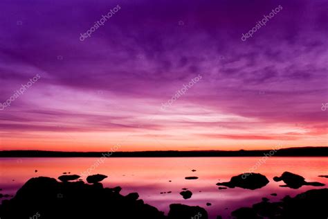 Purple sunset over sea water — Stock Photo © LarioTus #32978661