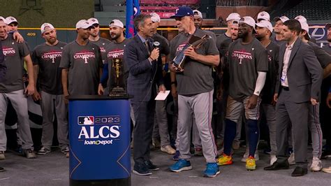 The Rangers are presented with the 2023 ALCS trophy | 10/24/2023 ...