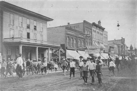 Early scene, downtown Greenville, Michigan. Late 1880s. Dirt streets ...