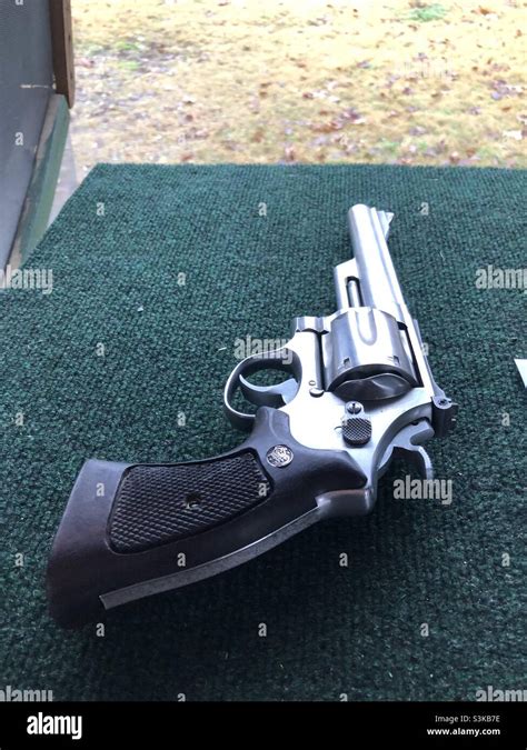 A Magnum 44 revolver lays on the table at a shooting range in Texas USA ...