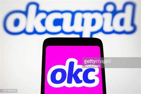 In this photo illustration, the OkCupid logo is seen on a smartphone ...