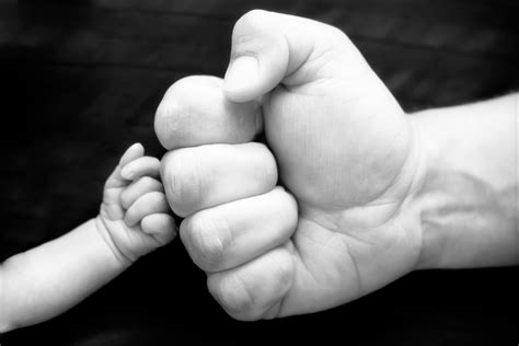 love from momma: daddy and son's first fist bump... Father And Son ...