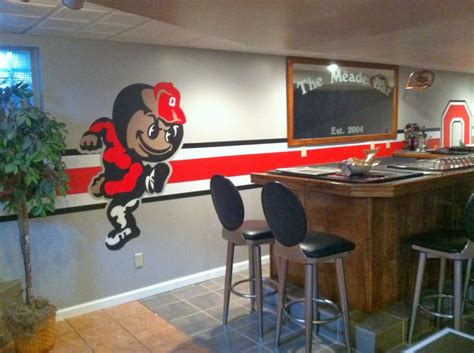 Meade's Sports Themed Basement | Man cave home bar, Man cave basement ...