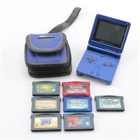 Game Boy Advance SP, Games and Case Featuring Pokémon Ruby and Sapphire ...