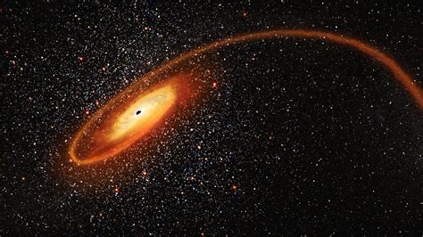 Hubble Finds “Missing Link” Black Hole Tearing Apart a Star That Passed ...