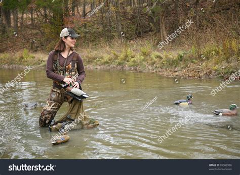 Woman Duck Hunter In Pond Wearing Camo Waders Stock Photo 89088988 ...