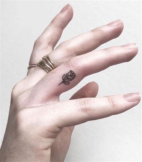 finger tattoo little rose | Tiny Tattoo inc.