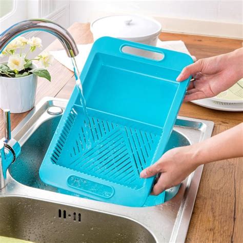 Over-The-Sink Cutting Board Lets You Clean, Chop, and Collect