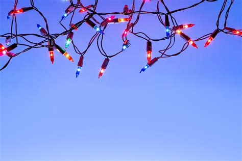 Christmas lights string on blue background with copy space 6708135 ...