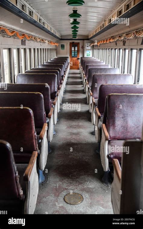 Vintage and abandoned empty railroad train car on the train tracks ...