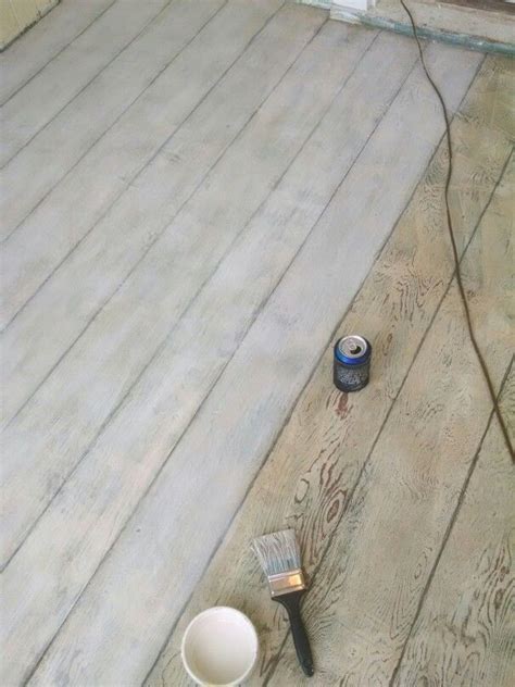 Plywood floor... Drew lines for boards and dry brush painted with white ...