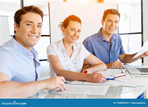 Group of Happy Young Business People in a Meeting Stock Image - Image ...