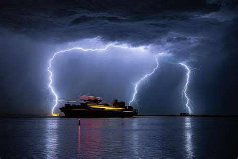 Sailing Ship During A Severe Lightning Storm Stock Photo - Download ...