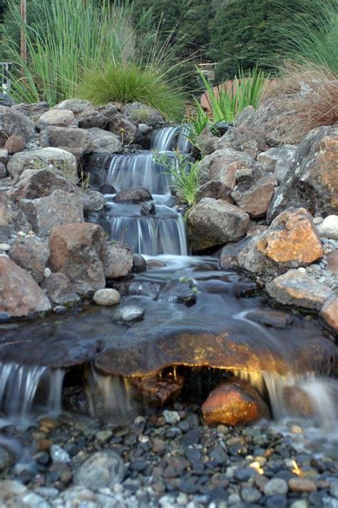 Pondless waterfall | Waterfalls backyard, Garden waterfall, Ponds backyard