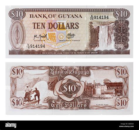 Exotic currency money - ten dollars of Guyana Stock Photo - Alamy