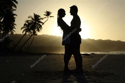 Silhouette couple at the beach Stock Photo by ©eddiephotograph 1177826