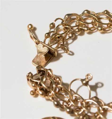 Adrienne's Heirlooms for Appraisal : 1961 Vintage 14k Gold 5-Charm Bracelet