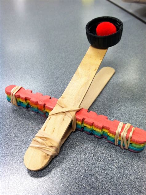 DIY catapult out of Popsicle sticks and rubber bands.. Easy and fun ...