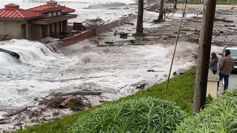 Massive waves flood Santa Cruz as storm surges across California coast