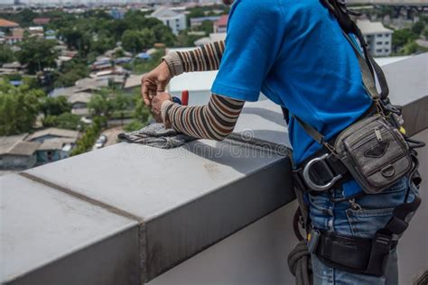 Workers Cleaning Windows Service on High Rise Building Stock Photo ...