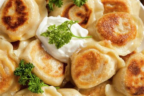 Traditional Polish dumplings served with sour cream - ePuzzle photo puzzle