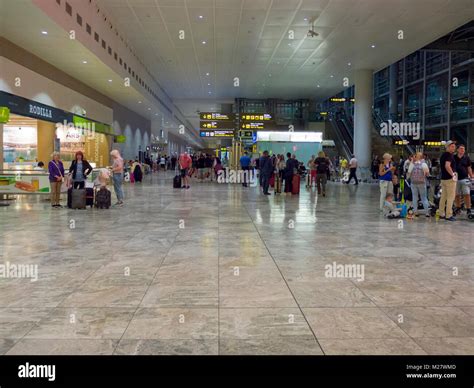 The arrivals hall at Alicante Airport at night. Alicante, Spain Stock ...