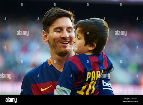 Lionel Messi (FC Barcelona) hold his son Thiago, during La Liga soccer ...