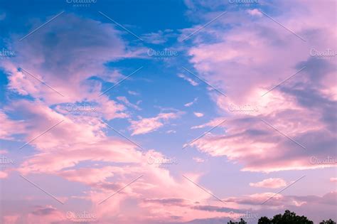 Pink clouds on sunset sky ~ Nature Photos ~ Creative Market