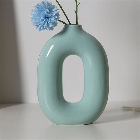 Vintage Blue Oval Ceramic Vase – Famous Mountain