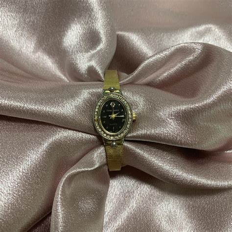 Vintage dainty gold watch Beautiful timeless black... - Depop