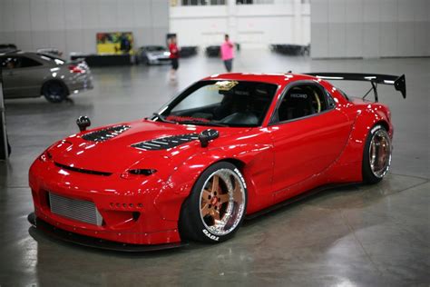 Rocket Bunny RX7 three quarter view | Mazda rx7, Rx7, Mazda