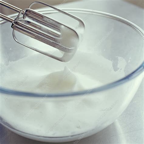 Whisking egg whites - Stock Image - H110/2546 - Science Photo Library