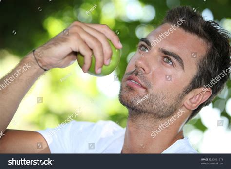 Man Eating An Apple Under A Tree Stock Photo 80851273 : Shutterstock