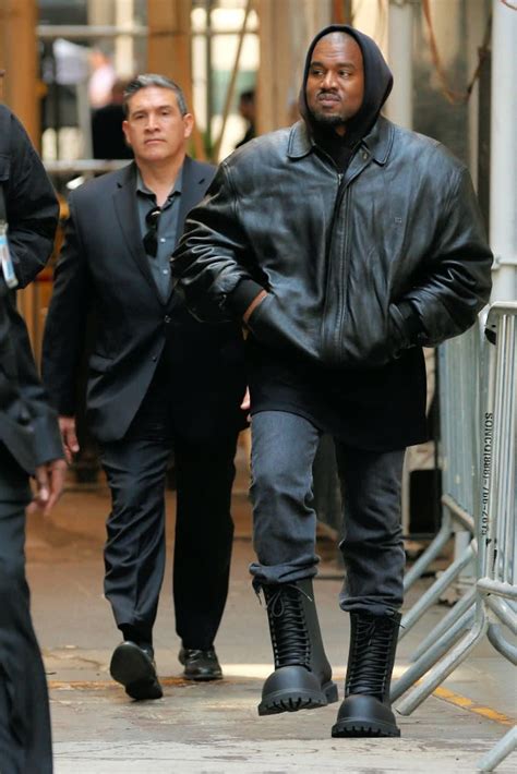 Kanye West Laces Into Runway Combat Boots with Leather Jacket at ...