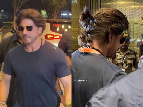 Shah Rukh Khan sports ponytail look as he gets snapped at Mumbai airport