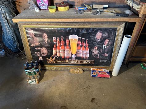 LARGE FRAMED BUDWEISER POSTER AND MORE | EstateSales.org