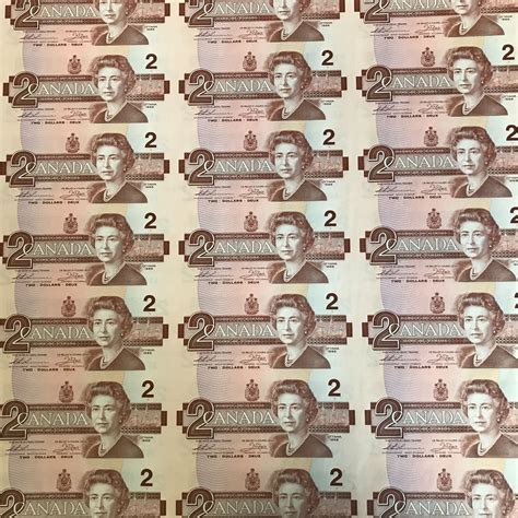 UNCUT SHEET OF 1986 CANADIAN $2 DOLLAR BILLS (UNCIRCULATED)