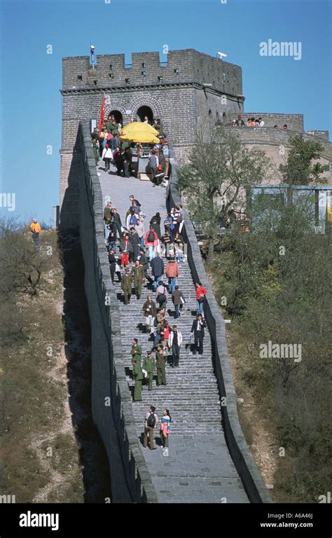 China, Beijing, Great Wall of China, visitors walking on carriageway to ...