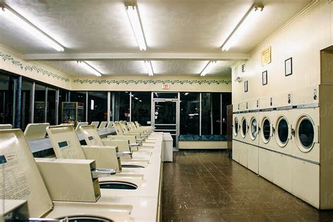 "Laundromat Interior" by Stocksy Contributor "Raymond Forbes LLC" - Stocksy