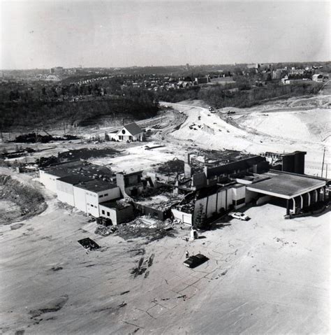 an old black and white photo of a factory in the middle of nowhere with ...