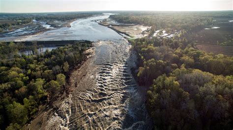 Wixom Lake drained; flooding from Edenville dam break destroys bridge